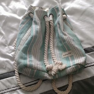 Teal and cream backpack